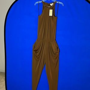 Michael Kors jumpsuit size small.  Never worn.